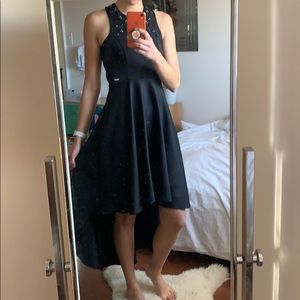 Black high low dress with crossed back NWT